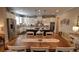 Spacious eat-in kitchen featuring white cabinets, stainless steel appliances, and a dark island at 2771 Middlecreek Way, Cumming, GA 30041