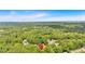 Find your home nestled in lush greenery with this home's convenient location at 387 Rose Creek Pl, Woodstock, GA 30189