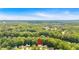 Find your home nestled in lush greenery with this home's convenient location at 387 Rose Creek Pl, Woodstock, GA 30189