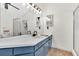 Bright bathroom featuring a walk-in shower, spacious vanity, and lots of storage at 387 Rose Creek Pl, Woodstock, GA 30189