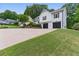 Lovely two-story home with a spacious driveway and attached two-car garage at 387 Rose Creek Pl, Woodstock, GA 30189