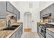 Beautiful kitchen featuring granite countertops and stainless steel appliances at 387 Rose Creek Pl, Woodstock, GA 30189
