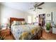 Comfortable bedroom featuring a queen-sized bed, ceiling fan, and ample closet space at 1336 Sharon St, Atlanta, GA 30314