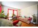 Bright living room featuring hardwood floors, large windows, and comfortable sofa at 1336 Sharon St, Atlanta, GA 30314