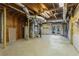 Unfinished basement with exposed ductwork and a walkout to the backyard at 2917 Rockbridge Rd, Marietta, GA 30066