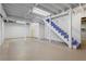 Spacious unfinished basement with white painted walls and exposed ceiling beams at 2917 Rockbridge Rd, Marietta, GA 30066