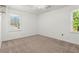 Bright bedroom featuring neutral carpet, natural light and a ceiling fan at 2917 Rockbridge Rd, Marietta, GA 30066