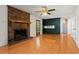 Spacious living room boasts a brick fireplace and gleaming hardwood floors at 2917 Rockbridge Rd, Marietta, GA 30066