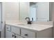 Bright bathroom with a modern sink and a large mirror at 3564 Arrow Root Cir, Loganville, GA 30052