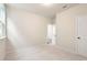 Cozy bedroom featuring plush carpet, a window, and white walls at 3564 Arrow Root Cir, Loganville, GA 30052