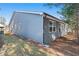 Gray home with white trim and a well-maintained lawn at 3564 Arrow Root Cir, Loganville, GA 30052