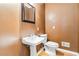 A small bathroom with a pedestal sink at 4002 Turnstone Nw Dr, Kennesaw, GA 30152
