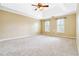A primary bedroom with carpet at 4002 Turnstone Nw Dr, Kennesaw, GA 30152