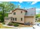 Exterior features back porch with stairs and two AC units at 4002 Turnstone Nw Dr, Kennesaw, GA 30152