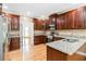 A kitchen with stainless steel appliances and hardwood floors at 4002 Turnstone Nw Dr, Kennesaw, GA 30152