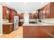 A kitchen with stainless steel refrigerator and hardwood floors at 4002 Turnstone Nw Dr, Kennesaw, GA 30152
