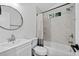 Modern bathroom features sleek fixtures, including a vanity and a shower-over-tub at 1142 Palafox Ne Dr, Atlanta, GA 30324