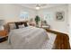 Serene bedroom with hardwood floors, natural light, and tasteful decor at 1142 Palafox Ne Dr, Atlanta, GA 30324