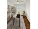 Comfortable home office with natural light and stylish decor and shelving at 1142 Palafox Ne Dr, Atlanta, GA 30324