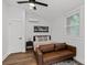 Bright studio apartment features an open layout, stylish furniture, and hardwood floors at 1142 Palafox Ne Dr, Atlanta, GA 30324