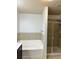 Bathroom showcasing a bathtub and separate shower stall at 2249 Knoxhill Se Vw, Smyrna, GA 30082