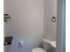 Half bathroom with a toilet, sink and black shelf at 2249 Knoxhill Se Vw, Smyrna, GA 30082