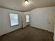 Bedroom with neutral carpet and natural light from the windows at 2249 Knoxhill Se Vw, Smyrna, GA 30082