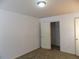 Bedroom with carpet flooring and two doors, one leading into a walk in closet at 2249 Knoxhill Se Vw, Smyrna, GA 30082