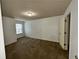 Bedroom with neutral carpet and natural light from the windows at 2249 Knoxhill Se Vw, Smyrna, GA 30082