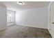 Bedroom featuring a window for natural light and neutral carpet at 2249 Knoxhill Se Vw, Smyrna, GA 30082