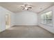 Spacious bedroom features high ceilings, a ceiling fan, and natural light at 2249 Knoxhill Se Vw, Smyrna, GA 30082