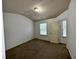 Bedroom with neutral carpet and natural light from the windows at 2249 Knoxhill Se Vw, Smyrna, GA 30082