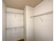 Walk-in closet fitted with metal shelves providing efficient storage at 2249 Knoxhill Se Vw, Smyrna, GA 30082