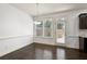 Bright dining area featuring hardwood floors and a pendant light at 2249 Knoxhill Se Vw, Smyrna, GA 30082