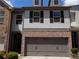 Two story townhome with a two car garage and neutral colors at 2249 Knoxhill Se Vw, Smyrna, GA 30082