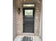 Close up of the home's front door with the house number at 2249 Knoxhill Se Vw, Smyrna, GA 30082