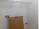 The laundry room has a wire rack on the top shelf, and hookups at 2249 Knoxhill Se Vw, Smyrna, GA 30082