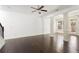 Hardwood flooring in a spacious living room, with natural light, and columns at 2249 Knoxhill Se Vw, Smyrna, GA 30082