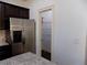 Open shelving in the walk-in pantry for organized storage solutions at 2249 Knoxhill Se Vw, Smyrna, GA 30082