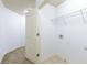 Spacious walk-in closet with carpet, shelving, and overhead lighting at 2249 Knoxhill Se Vw, Smyrna, GA 30082