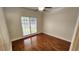 Bedroom featuring hardwood floors and a window at 3858 Glenlake Dr, Douglasville, GA 30134