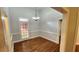 Dining room featuring hardwood floors, neutral paint, and natural light at 3858 Glenlake Dr, Douglasville, GA 30134