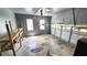 Spacious garage with ample storage, shelving, and garage door at 3858 Glenlake Dr, Douglasville, GA 30134