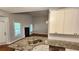 Bright kitchen featuring granite countertops, stainless steel appliances, and subway tile backsplash at 3858 Glenlake Dr, Douglasville, GA 30134