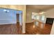 View of the entry into a spacious living room with a fireplace at 3858 Glenlake Dr, Douglasville, GA 30134