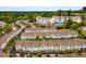 Aerial view of the townhome community, showcasing mature trees and inviting swimming pool at 221 Semel Nw Dr # 273, Atlanta, GA 30309