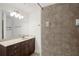 Spacious bathroom vanity with ample counter space and a tiled shower at 221 Semel Nw Dr # 273, Atlanta, GA 30309