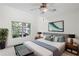 Spacious bedroom boasts natural light from the window and features a modern ceiling fan at 221 Semel Nw Dr # 273, Atlanta, GA 30309