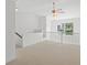 Spacious bonus room features ceiling fan and overlooks neighborhood at 221 Semel Nw Dr # 273, Atlanta, GA 30309