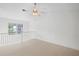 A carpeted bonus room with a window and a ceiling fan at 221 Semel Nw Dr # 273, Atlanta, GA 30309